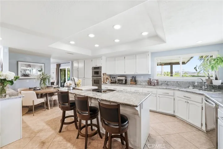 Kitchen  has a beautiful view. and a breakfast nook.