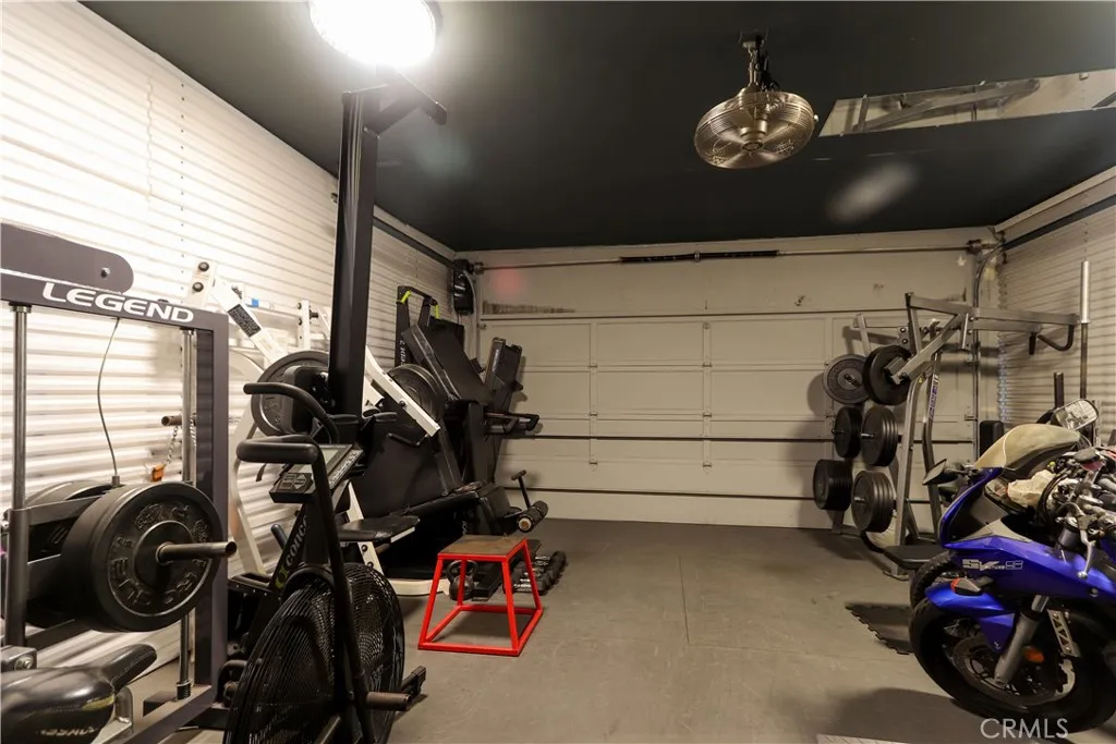 Attached 2 Car Direct Access Garage turned into home gym