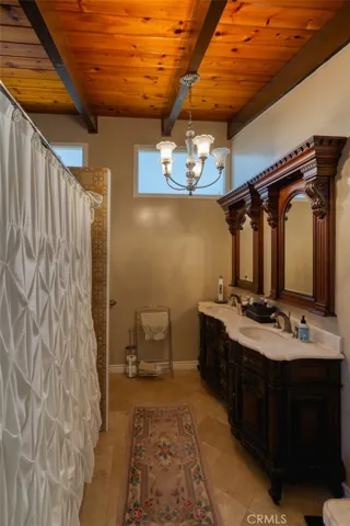 Primary bathroom.  Photo may have been processed using AI
