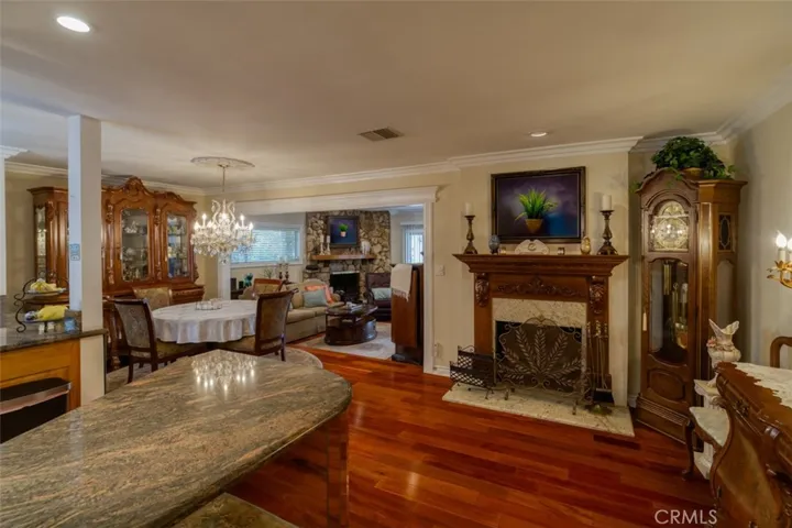 Dining area off of kitchen.  Photo may have been processed using AI