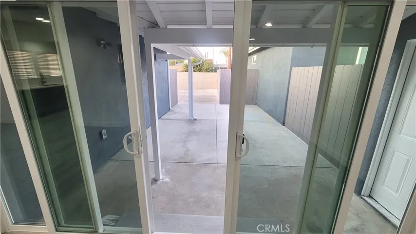 Enclosed Covered Patio off the Kitchen
