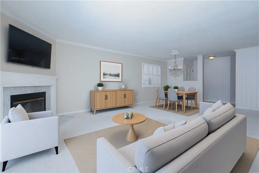 Virtually staged liv rm looking into dining room