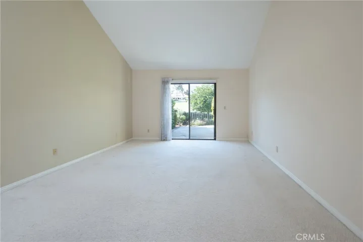 Primary bedroom with slider opens to patio