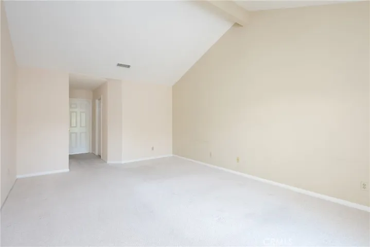 Primary bedroom with walk-in closet