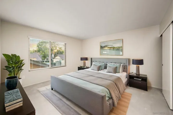 Bedroom 2: 13'x13' - Photo is virtually staged. See uploaded unstaged photo for reference.