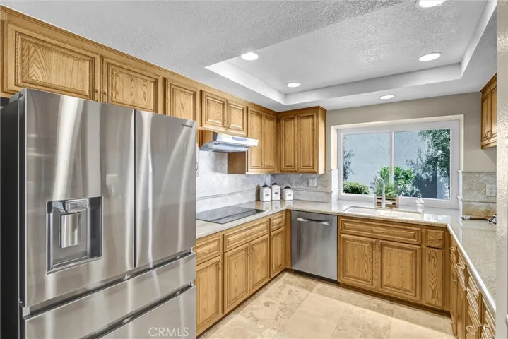 Kitchen has a Bosch Induction Cooktop