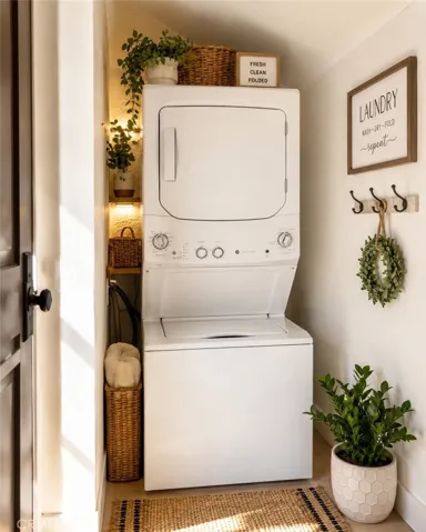 Convenient in unit stacked washer and dryer with dedicated laundry space