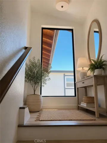 Welcoming second-floor entry with expensive window and natural light