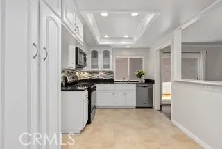 Remodeled and updated kitchen opens to living space