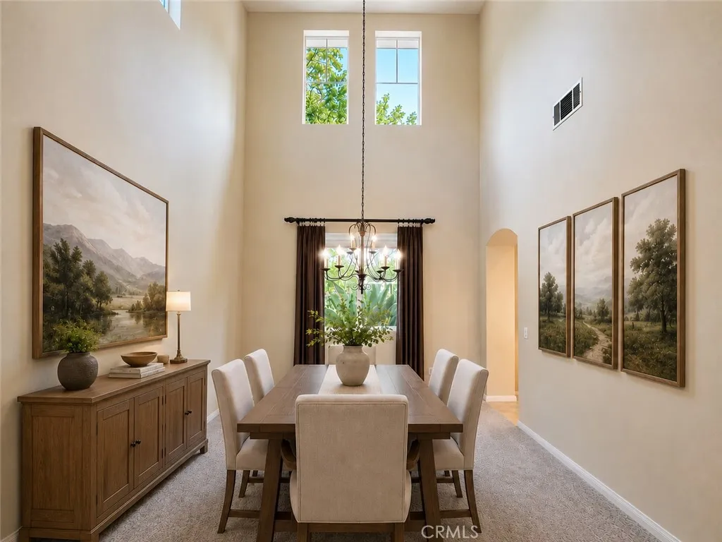Dining room digitally altered, virtually staged