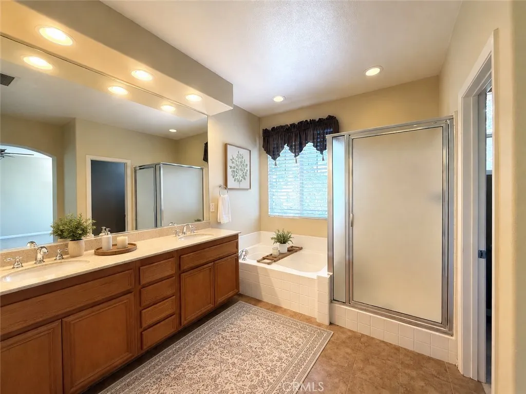 Primary bathroom digitally altered, virtually staged