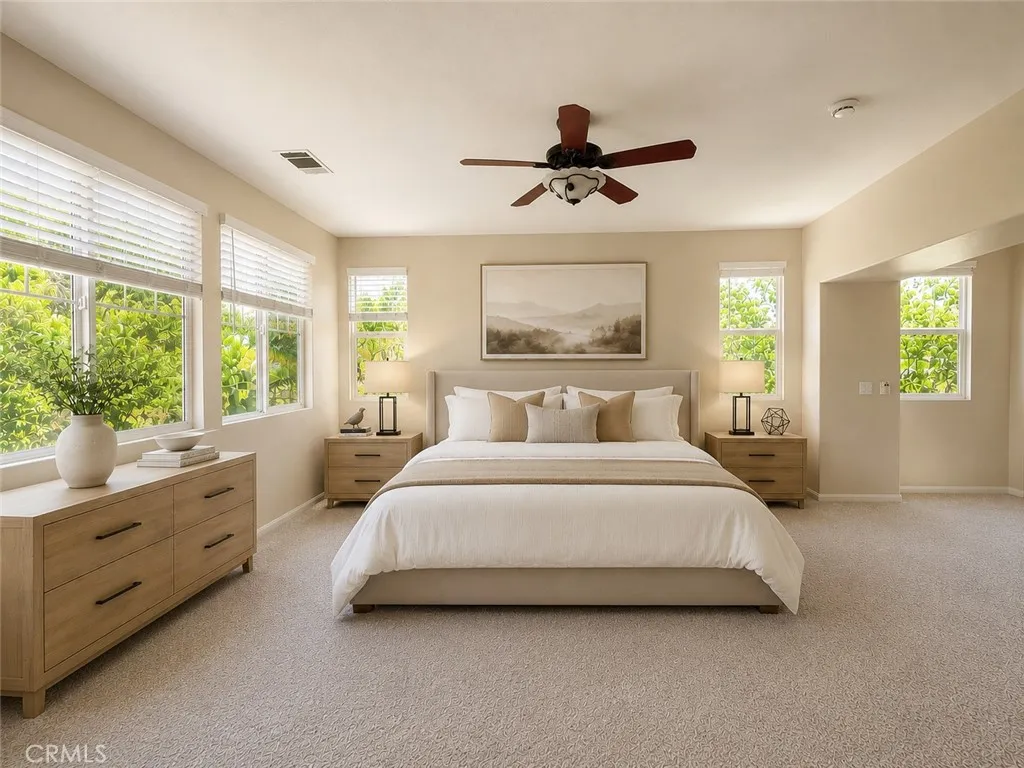 Primary bedroom digitally altered, virtually staged