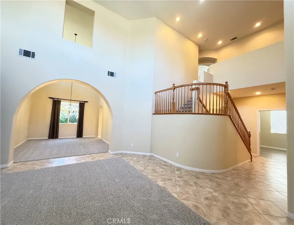Living room with dining area beyond