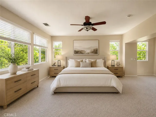 Primary bedroom digitally altered, virtually staged