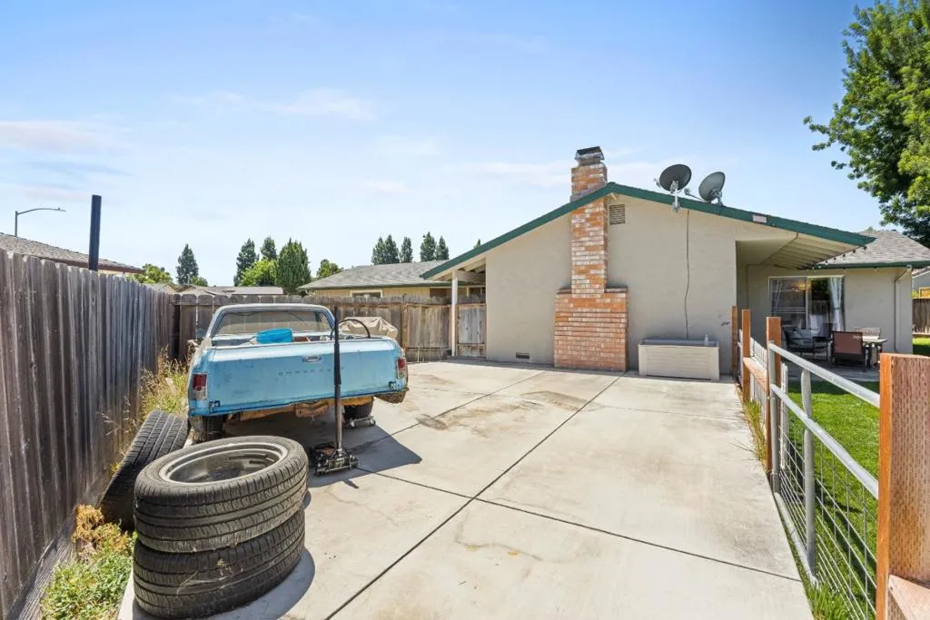 huge concrete pad in backyard has tons of potential