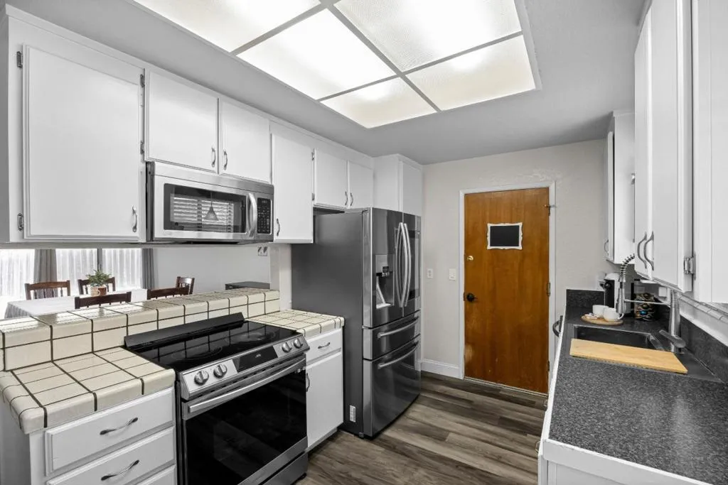 galley kitchen - access to garage shown here
