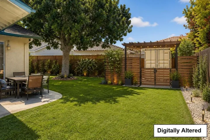 Shown here with fencing to show a possibility of blending the shipping container into the yard