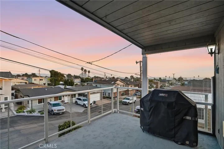 Front Patio off of dining room with views of ocean to the west, Morro Rock to the south, and the hills to the east