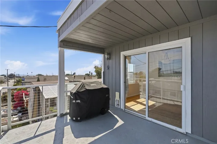 Front Patio off of dining room with views of ocean to the west, Morro Rock to the south, and the hills to the east