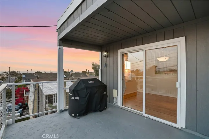Front Patio off of dining room with views of ocean to the west, Morro Rock to the south, and the hills to the east