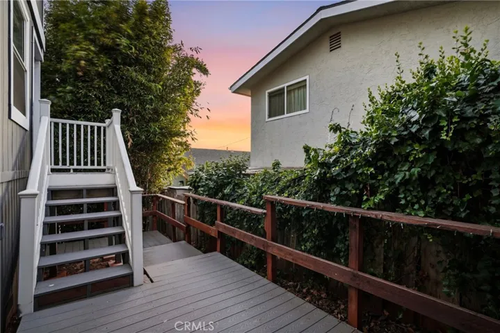 Back patio accessed by bedroom 3 as well as by both side yards.