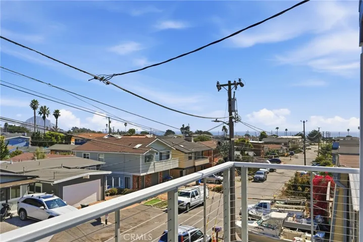 Front Patio off of dining room with views of ocean to the west, Morro Rock to the south, and the hills to the east
