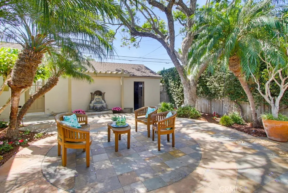 Natural stone patio complete with a gorgeous fountain