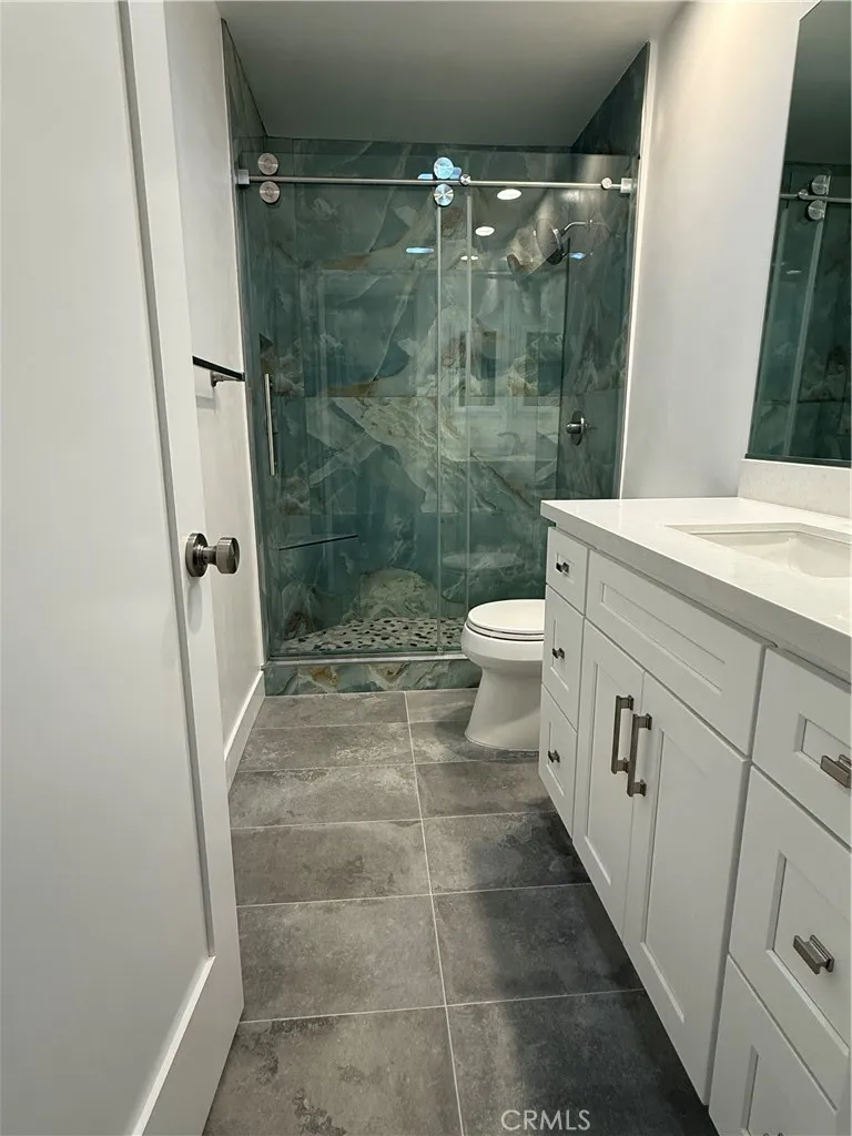 Main bathroom including walk in shower.