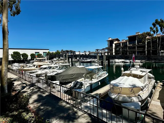 View of boat slips and private bridge to Marina Pacifica Shopping Center.