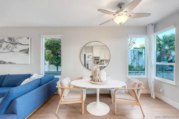 Breakfast nook adjoins kitchen and family room w/ double doors to patio area.