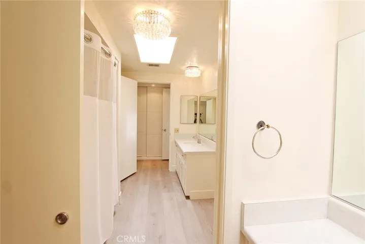 Guest Half Bath to Primary Bathroom