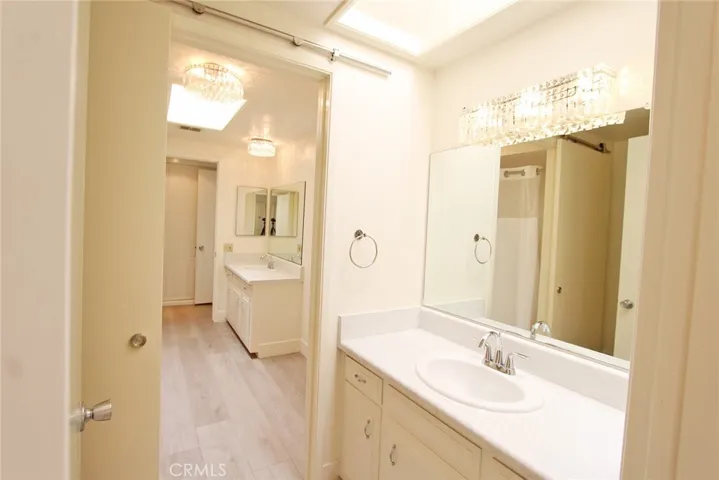Guest Half Bath to Primary Bathroom