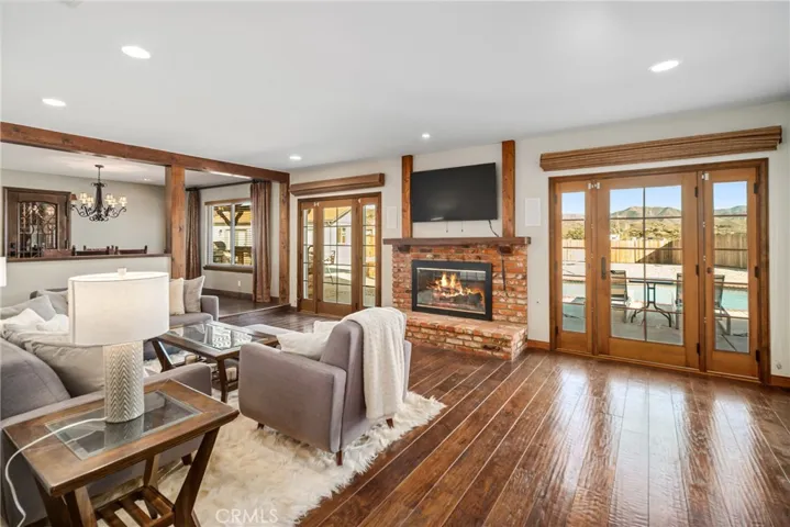 Virtually altered/staged to add flames in fireplace