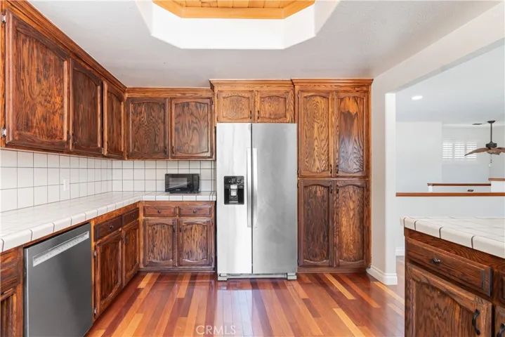 This refrigerator is slated to remain with the home making your move in even easier!