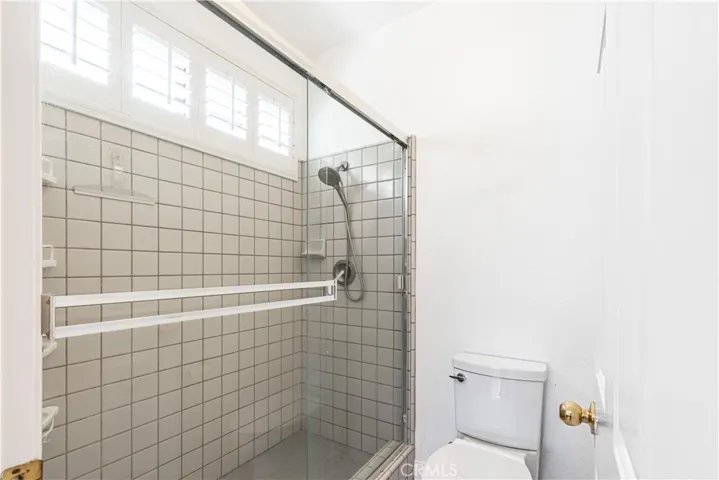Plenty of light and a spacious shower in the primary bath