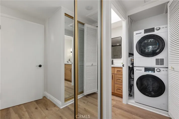 Main bedroom closet with washer/dryer
