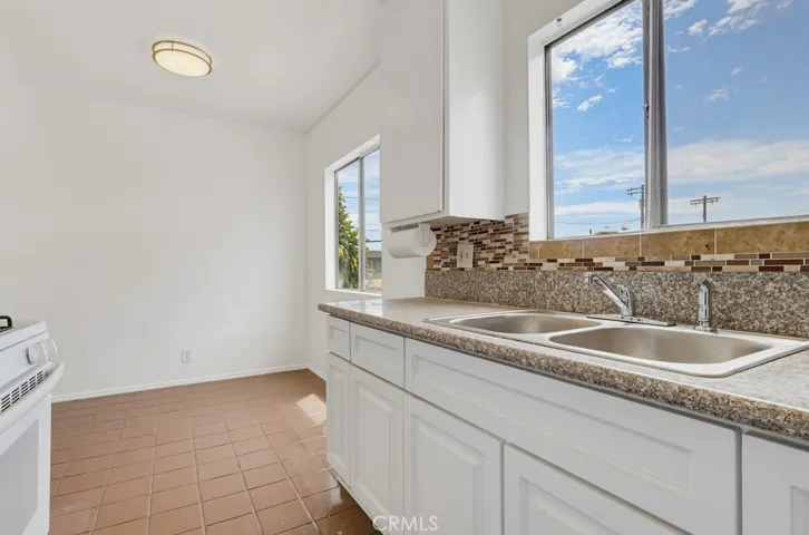 Unit 4 - Talk with Family in Dining Area while Cooking in the Kitchen