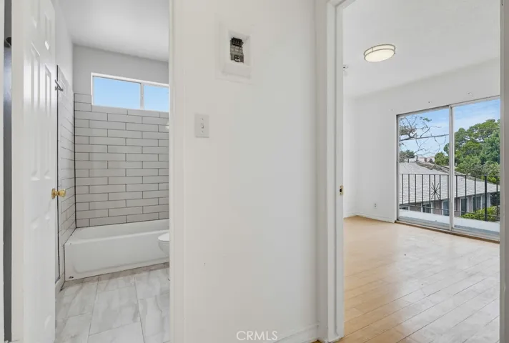 Unit 4 - Bedroom with Balcony & Hallway Bathroom
