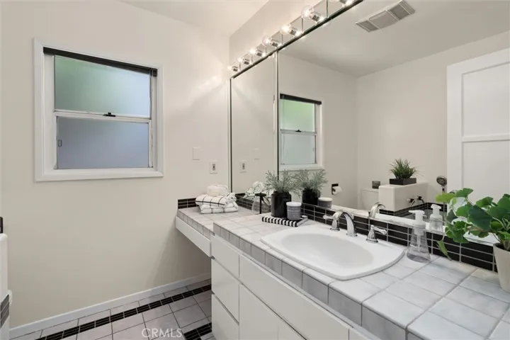 MAIN HALL BATH WITH SOAKING TUB