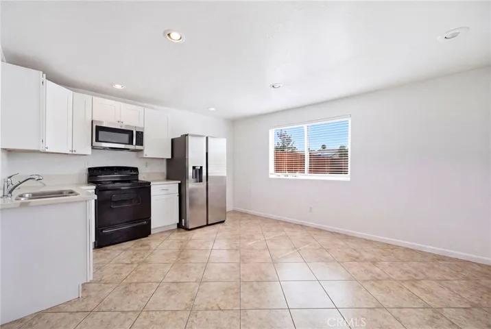 Unit #2: 1 Bd/ 1 Bath Living Room & Kitchen