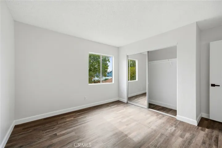 Main Unit: 4 Bd/2.5 Bath Bedroom #3 with Mirrored Closet Doors