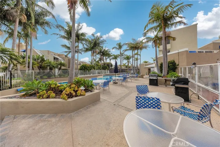 BBQ area is located adjacent to the pool.