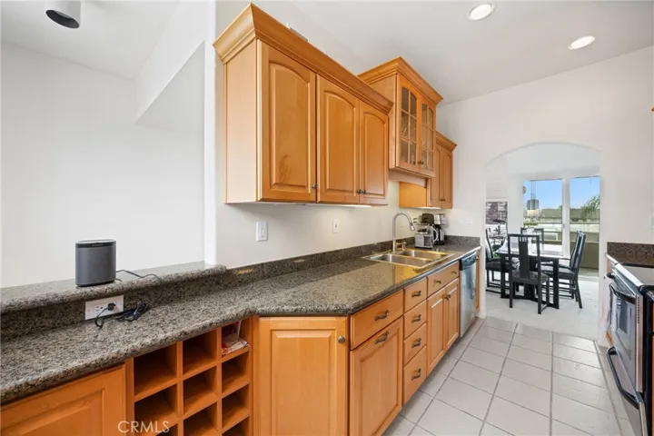 Granite countertops and stainless appliances.