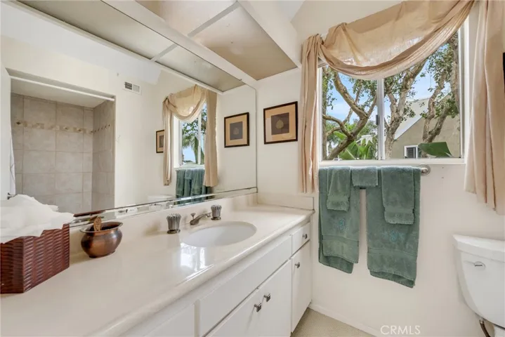 Guest bathroom is located adjacent to the media/family room.