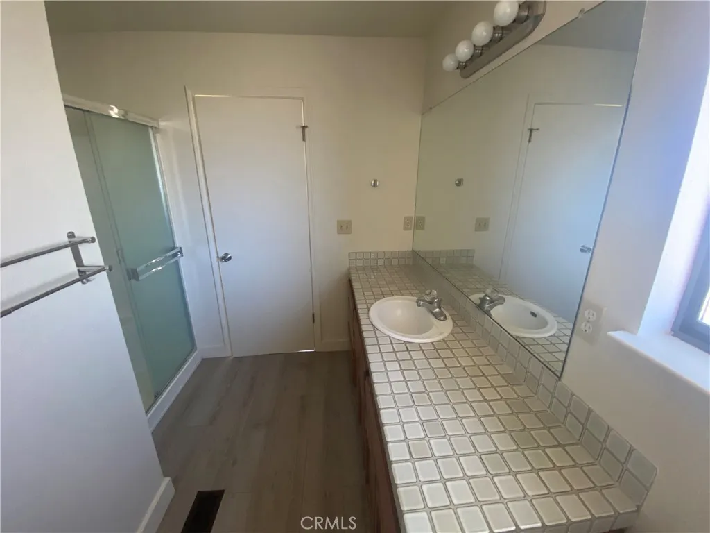 Primary bath with stand alone shower.