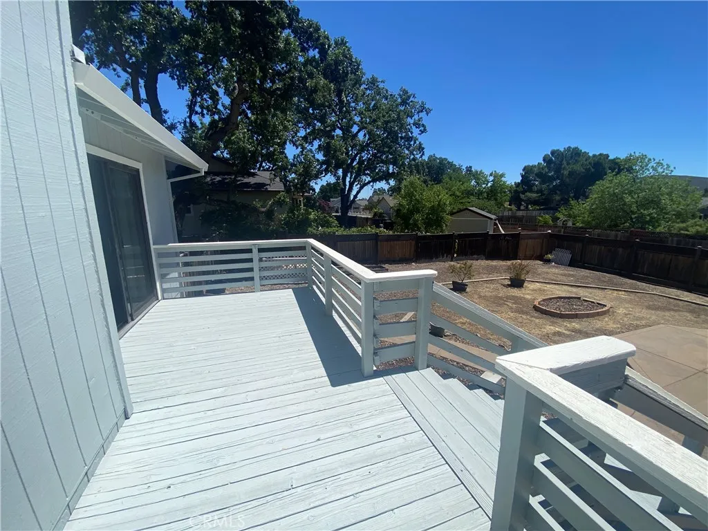 Lovely back deck accessible from dining area and primary bedroom.