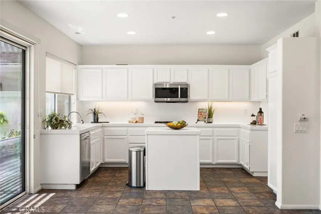 Modern kitchen with white cabinets