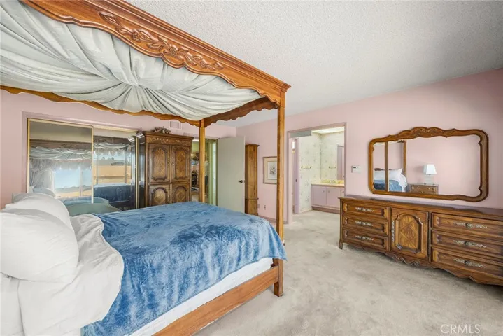 Primary Bedroom #1, with Balcony access