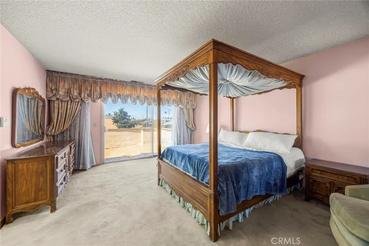 Upstairs Primary #1 Bedroom, with Balcony access