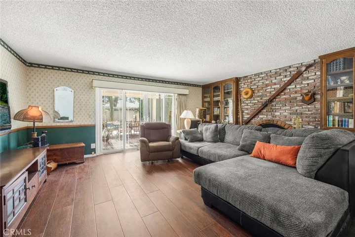 Step down to large Family room-opens to backyard Patio & Pool